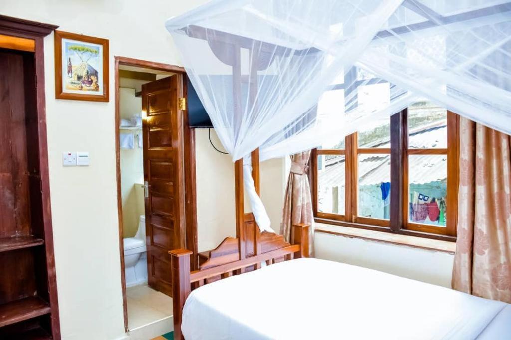 Red Sun Lodge Kokoni Ngambo Buitenkant foto